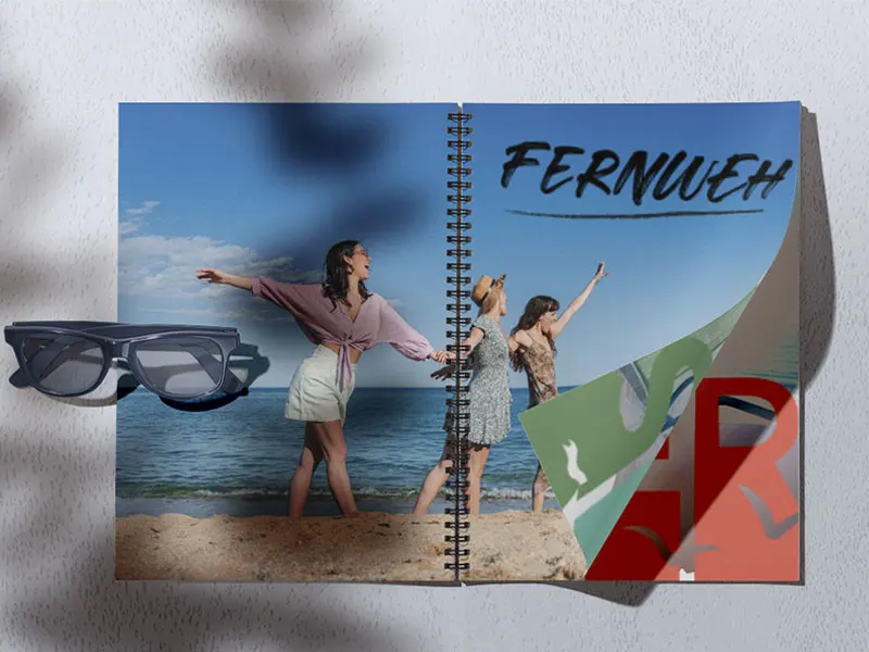 Aufgeschlagenes Fotoalbum mit Spiralbindung und Urlaubsfotos